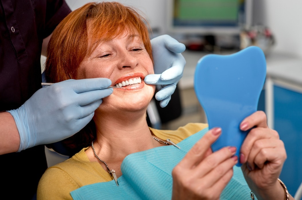 Senior woman in the dental office.